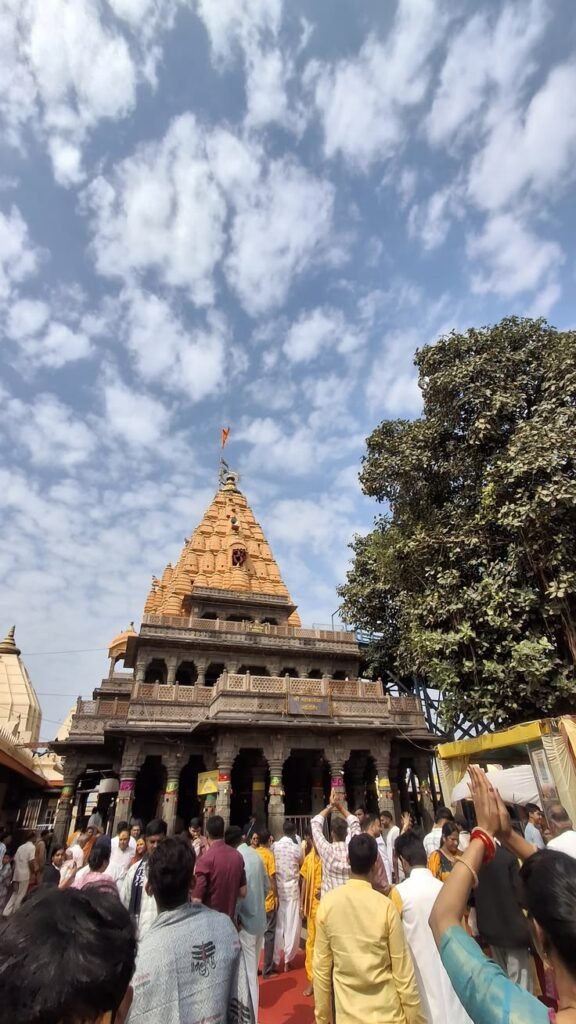 Jyotirlinga temple with devotees during darshan and worship